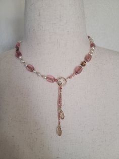 "This necklace is 18\" long, plus a 3\" drop on the double teardrop lariat closure. There are Swarovski glass pearls, Murano glass beads, and tiny glass beads in pink, ecru, and clear. These are strung on wire, and 14k gold filled components are used. Presented in an organza drawstring bag." Homemade Jewelry Ideas Necklace, Bead Jewellery Making Ideas Necklaces, Diy Gold Necklace, Pink Pearl Drop Beaded Necklaces With Round Beads, Pink Elegant Dangle Beaded Necklaces, Pearl Beaded Dangle Necklaces, Elegant Pink Czech Glass Necklaces, Pink Pearl Dangle Necklaces, Adjustable Pink Pearl Necklace With Beaded Chain