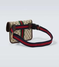 Classic house codes such as GG Supreme canvas, Double G hardware, and the Web stripe bring Gucci's heritage to the forefront of its Ophidia line. This compact belt bag has leather trims, an adjustable grosgrain strap, and golden hardware..Material: fabric.Made in Italy.Designer color name: B.Eb/N.Acero/Vrv/Brb.Closure: magnetic fastening.Trim: leather.Adjustable belt strap.Height 17cm-6.5'.Width 24cm-9.5'.Max. depth 3cm-1'.Min. length shoulder strap 90cm-35.5'.Max. length shoulder strap 126cm-49 Brown Leather Gucci Belt Bag, Gucci Brown Leather Belt Bag, Gucci Canvas Bag With Adjustable Strap, Rectangular Leather Gucci Belt Bag, Gucci Rectangular Bag With Logo Strap, Classic Gucci Belt Bag For Travel, Gucci Rectangular Canvas Bag, Gucci Canvas Bags With Leather Trim, Designer Gucci Bag With Logo Strap