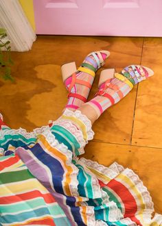 Make your look extra colorful with our oh-so-sweet Candy Stripe Ruffle Sock. We elevated the design with peekaboo sheer stripes and a sheer ruffle cuff. Shop on SockCandy.com. Fashion socks, socks and sandals, socks and heels, socks and shoes, rainbow outfit, rainbow shoes. Maximalist Photoshoot, Ruffle Sock, Sandals Socks, Sandals With Socks, Candy Fashion, Women Socks Fashion, Ruffled Socks, Funky Dresses, Rainbow Shoes