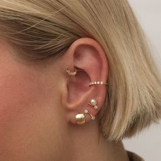 Bonjour every day in this luxe chubby hoop earring. Paris is a sleek and minimal hoop, uniquely set on a piercing stud for all day comfort and maximum impact. Created for you in solid 14 karat white gold, you'll want to wear this forever hoop always and never take them off, even when working out or in the shower. Round Internally Threaded Cartilage Earrings, Internally Threaded Round Cartilage Earrings, Elegant Hypoallergenic Hoop Piercings, Modern Internally Threaded Hoop Earrings For Everyday Wear, Internally Threaded Round Piercings, Modern Huggie Piercings For Everyday, Modern Everyday Huggie Piercings, Trendy Internally Threaded Huggie Earrings, Minimalist Internally Threaded Huggie Earrings For Everyday