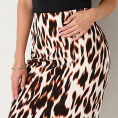 This Bold Elements women's leopard-print midi skirt is a sleek contemporary style to elevate your work or evening wear. Made from a soft stretch-scuba, this pencil skirt has an elastic pull-on waist and fitted silhouette. Wear it with a blouse or turtleneck. Front Style: Flat FrontClosure Type: Full ElasticRise: At WaistApparel Length: 26.5 InchesFiber Content: 97% Polyester, 3% SpandexFabric Description: ScubaLining: UnlinedSkirt Length: Midi LengthCare: Tumble Dry, Machine WashSkirt Type: Pen… Fitted Elegant Leopard Print Skirt, Elegant Fitted Leopard Print Skirt, Elegant Leopard Print Skirt, Chic Leopard Print Pencil Skirt, Elegant Leopard Print Lined Skirt, Stretch Leopard Print Pencil Skirt, Chic Stretch Leopard Print Skirt, Chic Leopard Print Stretch Skirt, Chic Leopard Print Midi Skirt