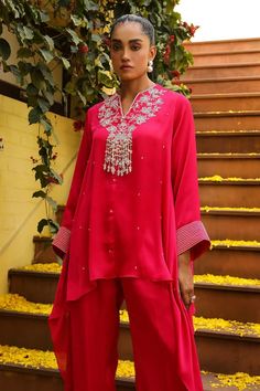 Rani pink kaftan with crystal tassel, sequin, cutdana, bead embroidered yoke. Paired with palazzo. - Aza Fashions Pink Zari Work Kaftan For Party, Elegant Pink Kaftan For Diwali, Traditional Pink Kaftan For Party, Traditional Pink Georgette Kaftan, Bollywood Style Embellished Pink Palazzo Set, Embellished Pink Palazzo Set For Diwali, Pink Embellished Palazzo Set For Diwali, Pink Bollywood Style Embellished Palazzo Set, Festive Hand Embellished Kaftan With Traditional Drape