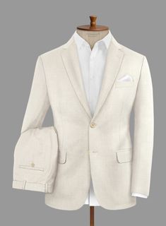 Indulge in the exquisite craftsmanship of this outstanding Loro Piana Bianchi Wool Silk Linen suit, designed for a man of discerning taste. Meticulously woven from premium wool, silk, and linen, it offers a luxuriously smooth texture with a subtle sheen, ensuring both comfort and elegance. This impeccably tailored suit, featuring a solid pattern and a beige hue, provides versatility and a refined look suitable for various occasions. It effortlessly transitions from professional settings to formal events with seamless elegance.    A marriage of elegance and comfort, Loro Piana fabrics are made using the highest quality raw materials in the world, in their purest form or blended together. A sophisticated response to the dictates of contemporary elegance, these fabrics lend themselves to a wi Beige Wool Suit For Semi-formal Occasions, Beige Wool Suits For Semi-formal Occasions, Tailored Luxury Linen Blazer, Semi-formal Beige Wool Suit, Luxury Single Breasted Linen Blazer, Luxury Tailored Linen Blazer, Luxury Linen Single Breasted Blazer, Luxury Single-button Sets With Notch Lapel, Elegant Formal Silk Unstitched Suit