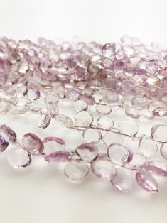 Pink Amethyst Flat Faceted Round Gemstone Beads, Semi Precious Gemstone Half off sale! Normally sold at $66.00 a strand.  Sold by the strand.  Specifications: Gemstone: Pink Amethyst  Shape: Flat Faceted Round, side drilled Size: 8mm Strand Length: 8" ----------------------------------------------------------- We ship in 1 to 3 days from Hawaii by First Class Airmail. Shipping to the USA usually takes 3 to 5 days. We import these Tahitian pearls straight from the crystal-clear lagoons of French Polynesia. Over the last 10 years of working with Tahitian pearl farmers and auction houses in Tahiti we are able to give our clients a large selection of Tahitian Pearls to choose from with competitive prices and excellent quality. Our office is in Hawaii on the island of Oahu. We are open Monday t Rondelle Amethyst Gemstone Beads, Amethyst Rondelle Gemstone Beads, Purple Rondelle Gemstone Beads, Amethyst Gemstone Beads, Purple Faceted Beads Amethyst Gemstones, Purple Faceted Amethyst Beads, Purple Amethyst Faceted Beads Gemstones, Lavender Round Bead Crystal Necklaces, Lavender Crystal Necklaces With Round Beads