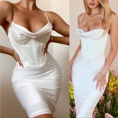 two women in white dresses one is wearing a dress and the other has a bra