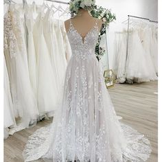 a wedding dress on display at a bridal shop