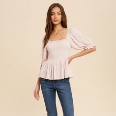 This Top Is A Smocked Top With A Square Neckline. Features Include Half Ruffled Sleeves With Elastic Ends, A Babydoll Silhouette And A Back Tie. 100% Rayon Fitted Peplum Top With Ruffle Hem And Puff Sleeves, Fitted Short Sleeve Smocked Peasant Top, Casual Peplum Top With Smocked Bodice And Puff Sleeves, Feminine Short Sleeve Peasant Top With Smocked Back, Solid Color Puff Sleeve Tops With Smocked Back, Solid Color Tops With Smocked Back And Puff Sleeves, Casual Fitted Peplum Top With Smocked Back, Casual Short Sleeve Peplum Top With Smocked Bodice, Spring Smocked Bodice Peplum Top With Puff Sleeves