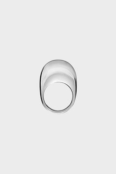 This item is final sale. Our statement Swipe design is inspired by the 'swipe to unlock' icon of an iPhone. Here it has been translated into a silver ring design in collaboration with London-based/Brazilian-born jeweller Alan Crocetti who is noted for his bold and sculptural gender-neutral designs. All accessories are final 100% Silver Modern Polished Finish Open Ring, Modern Silver Signet Ring, Modern Sterling Silver Dome Ring, Contemporary Open Ring With Polished Finish, Modern White Gold Open Dome Ring, Modern Silver Ring With Polished Finish, Modern Silver Dome Ring, Contemporary White Gold Rings With Polished Finish, Alan Crocetti