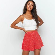 This bright red mini skirt is well-suited for a casual style statement. The soft fabric ensures your comfort as well. Your short Red skirt can be an ideal layering piece in the fall and winter when the weather is cool. Pair it with a simple white tank and a camel-colored cardigan for a stylish, low-key look leave the cardi open or button it up, and wear a skinny black belt over it to define your waist. Product Description Silhouette: Asymmetrical Pattern Type: Floral Material: Cotton, Polyester, Polka Skirt, Lifestyle Boutique, High Waist Pleated Skirt, Short Pollera, Pleated Skirt Short, Umbrella Skirt, Y2k Casual, Flared Mini Skirt, Red Mini Skirt