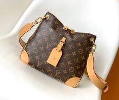 Louis Vuitton launched a new Odeon PM handbag (M45354) in the autumn and winter of 2020. The Monogram canvas is complemented by a zipper design with ample storage space, and the leather nameplate and reinforced leather corners continue the brand heritage. Adjustable shoulder strap for comfortable shoulder or cross-body wear.

 	Natural Cowhide and Monogram coated canvas.
 	Aged natural cowhide-leather trim.
 	Textile-lining.
 	Gold finished metal hardware.
 	Two leather corners.
 	Leather logo tag.
 	Main compartment double zip closure.
 	Exterior flat pocket with magnetic closure.
 	Interior flat pocket.
 	Adjustable and removable leather shoulder strap. (Drops Min: 40 cm, Drops Max: 50 cm)
 	Size: 24 x 22 x 8 cm (LxHxW).
 	Made in France.
 	Package included. New Louis Vuitton Handbags, Louis Vuitton Odeon, Louis Vuitton Yayoi Kusama, Cheap Louis Vuitton Handbags, Louis Vuitton Capucines, Used Louis Vuitton, Large Cosmetic Bag, Lv Purse, Medium Handbags