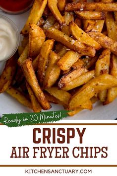 crispy air fryer fries on a white plate with ketchup and mayonnaise