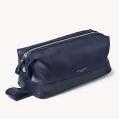 Men's Leather Wash Bag in Navy Saffiano | Aspinal of London Luxury Formal Rectangular Cosmetic Bag, Elegant Leather Travel Cosmetic Bag, Elegant Leather Cosmetic Bag For Business, Classic Leather Travel Cosmetic Bag, Elegant Rectangular Cosmetic Bag For Business, Luxury Leather Travel Cosmetic Bag, Classic Leather Cosmetic Bag For Business, Luxury Leather Cosmetic Bag With Zipper Closure, Modern Leather Cosmetic Bag For Business