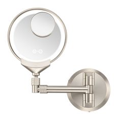 a close up of a bathroom mirror with a light on the side and one arm