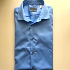 Excellent Condition Light Blue Men’s Warehouse Calvin Klein Long Sleeve Button Down Shirt Blue Slim Fit Dress Shirt, Fitted Blue Shirt For Semi-formal Occasions, Blue Slim Fit Shirt With Buttons, Blue Slim Fit Shirt With Button Closure, Slim Fit Blue Shirt With Buttons, Calvin Klein Button-up Tops For Business Casual, Blue Slim Fit Collared Dress Shirt, Blue Slim Fit Shirt, Blue Button-up Dress Shirt For Semi-formal Events