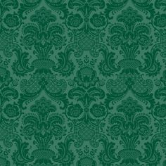 a green wallpaper with an ornate design