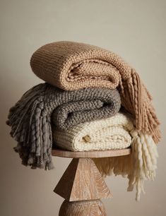 several blankets stacked on top of each other