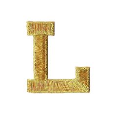 the letter l is made out of gold thread