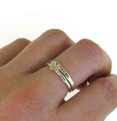 I am really excited about these dainty little rings! They are perfect for stacking with my other ring styles and are really cute worn on their own too! The bands are made out of solid sterling silver, and the hearts are made out of your choice of either solid sterling silver or solid Everyday Stackable Rings For Valentine's Day, Stackable Heart Cut Ring For Promise, Promise Stackable Heart Cut Ring, Stackable Heart Cut Promise Ring, Everyday Stackable Heart Ring, Stackable Everyday Heart Ring, Dainty Adjustable Tiny Heart Ring, Heart Shaped Stackable Rings For Everyday, Simple Adjustable Heart Ring For Anniversary