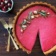 a red velvet pie with nuts on top