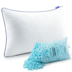 two pillows and a pillow on a white background