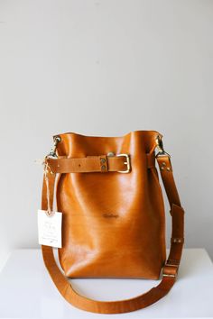 Bags and Purses, Leather Bag Women, Brown Leather Crossbody Bag, Leather Bucket Bag, Minimal Leather Bag, Small Leather Crossbody Bag, Pouch by QisaBags on Etsy https://www.etsy.com/listing/644016199/bags-and-purses-leather-bag-women-brown Leathercraft Pattern, Leather Travel Backpack, Scissor Kicks, Small Leather Backpack, Mini Leather Backpack, Large Leather Bag, Leather Crossbody Bag Small, Diy Leather Bag, Brown Leather Crossbody Bag