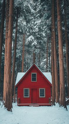 A cozy red cabin surrounded by tall trees dusted with snow, perfect for a winter-themed iPhone wallpaper background. Christmas Cottage Wallpaper, Cozy Winter Iphone Wallpaper, Winter Season Wallpaper, Red Christmas Aesthetic, Winter Screensavers, Winter Reference, Christmas Scenes Wallpaper, Magical Winter Forest