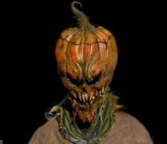 an image of a creepy pumpkin head on a mannequin