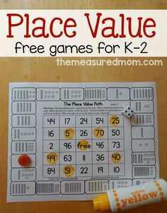 the place value game for k - 2 is shown with an orange marker on it