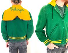 "Terrific vintage green & yellow letter jacket is made by DeLong. Very nice construction and quality. Probably dates back to the 70s or 80s. Tag reads: Shell: (Youth) size 20 80% recycled wool 15% unknown recycled fibers 5% other fibers Lining:  100% nylon Made in the USA Jacket has elastic waist and sleeve cuffs. Snaps closed in the front and is fully lined. Has two front pockets that are lined with warm flannel. Hood can be worn zipped up or down. A couple of patches have been carefully remove Green Collegiate Outerwear For Winter, Collegiate Green Winter Outerwear, Green Collegiate Winter Outerwear, Collegiate Green Outerwear For Fall, Green Collegiate Varsity Jacket For Fall, Fitted Green Varsity Outerwear, Green Fitted Varsity Outerwear, Vintage Green Hooded Outerwear, Green Hooded Vintage Outerwear