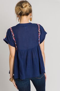 Summer Short Sleeve Blouse With Tassels, Summer Blouse With Tassels And Short Sleeves, Blue Tassel Blouse For Summer, Blue Spring Tops With Tassel Ties, Blue Spring Top With Tassel Ties, Bohemian Blue Top With Tassels, Blue Tassel Tops For Summer, Blue Beach Tops With Tassels, Beach Blue Tops With Tassels