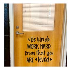 a wooden door with the words be kind work hard know that you are loved written on it