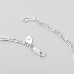 the bravura chain is a classic jewelry staple, crafted from sturdy sterling silver. the handsome rectangle links feature diamond cut edges designed to catch the light. Looking to start the perfect stack? Let this be the lead role or pair it with that chunky pendant that needs a trusty companion, Bravo! Silver Cable Chain Link Bracelet, Minimalist Necklace With Rectangular Pendant On Cable Chain, Silver Oval Link Chain Bracelet With Cable Detail, Sterling Silver Jewelry With Rectangular Pendant And Cable Chain, Silver Cable Chain Bracelet With Oval Links, Sterling Silver Jewelry With Cable Chain And Rectangular Pendant, Sterling Silver Bracelet With Cable Chain Design, White Gold Chain Bracelet With Oval Cable Links, White Gold Oval Link Cable Chain Bracelet