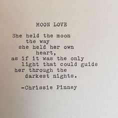 an old typewriter with the words moon love written in black ink on white paper