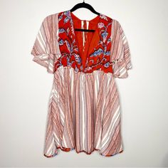 Free People Style: Under The Sun Tunic Floral Striped Mixed Pattern Red Rome Size Medium Pockets Woven Fabric Raw Hem New With Tags. Flaw: The Hook Closure At Bust Needs Repair. See Photos. It Is Missing One Hook. New Hooks Or Snap Can Be Easily Sewn On. Otherwise, It Is In Perfect Condition. It Comes With An Extra Button, But Unfortunately, Not An Extra Hook To Sew On. Some Double Sided Fabric Tape Would Work Also. A Little Love, Care And Repair Keeps Garments Out Of The Landfills. Chest Measur Bohemian Red V-neck Mini Dress, Red Bohemian V-neck Mini Dress, Red Printed Summer Mini Dress, Red Printed Mini Dress For Day Out, Red Printed Mini Dress For Vacation, Red Short Sleeve Mini Dress For Vacation, Red Short Sleeve Mini Dress For Summer, Bohemian Red Mini Dress For Day Out, Bohemian V-neck Mini Dress For Holiday