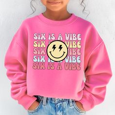 Celebrate her 6th birthday with this groovy Six is a vibe birthday sweatshirt. Ideal for any situation, a unisex heavy blend crewneck sweatshirt is pure comfort. These garments are made from polyester and cotton. This combination helps designs come out looking fresh and beautiful. The collar is ribbed knit, so it retains its shape even after washing. There are no itchy side seams on these sweaters. S I Z I N G Heavy Blend Crewneck Sweatshirt Youth:  XS(5) S(6/8) M(10/12) L(14/16) Adult: S M D E T A I L S 50% cotton, 50% polyester Medium-heavy fabric Loose fit Runs true to size This is a direct to garment print. Machine wash cold, inside-out, gentle cycle with mild detergent and similar colors. No fabric softeners. Tumble dry low, or hang-dry for longest life. Cool iron inside-out if necess Girls 6th Birthday, Girls 9th Birthday, Girls Birthday Shirt, Birthday Sweatshirt, Birthday Girl Shirt, 9th Birthday, 6th Birthday, Girls Birthday, Birthday Shirt