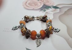 Orange  brown lava bead bracelet, Pandora Fascinating Orange Murano Glass Bead Charm, bracelet with gold lava stone ,  bright orange gemstone Bracelet Bracelets, , Gift Sets, Love-passion, , Women,  Elegant, Orange, Smooth; glassy  Gift: for Christmas, Valentine's Day, Mother's Day, Birthday, Summer party, Wedding Orange Pandora Bracelet, Lava Bead Bracelet, Orange Brown, Murano Glass Beads, Lava Bead, Lava Stone, Pandora Bracelet, Bright Orange, Summer Party