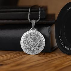 Valkyrie Man Necklace with Slavic Symbols in Mythology, Slavic Pagan Necklace in Sterling Silver, Warrior Necklace for Mans, Nordic Necklace * Gender : Female & Male      * Stamp: 925 Sterling Silver   * Finish: Oxidized - Polished - Gold Plated  - PRODUCT DETAILS -  * Pendant Diameter: 1.16 x 1.16 Inc ( 2.90 x 2.90 Cm )  * Pendant Weight: 12 - 13 Grams  * Bail: Suitable for up to 4.00 mm Chain  * Chain Weight : * 18 Inches: 4.00 - 4.50 Grams * 20 Inches: 5.00 - 5.50 Grams * 22 Inches: 5.25 - 5. Silver Viking Style Metal Necklace, Viking Style Engraved Metal Necklaces, Viking Style Silver Round Pendant Necklace, Viking Style Silver Pendant Necklace, Symbolic Stainless Steel Necklace With Large Pendant, Spiritual Stainless Steel Necklaces With Large Pendant, Spiritual Stainless Steel Necklace With Large Pendant, Viking Style Sterling Silver Round Pendant Jewelry, Viking Style Silver Stainless Steel Necklaces