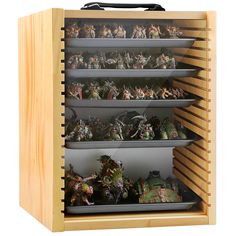 a wooden display case filled with lots of toy figurines in it's shelves