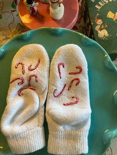 "Jumbled Candy Canes.  Perfect for opening Christmas Eve, or Christmas morning - keep your toesies cozy while presents are being opened!  Multiple variations are available - See my other listings. READY TO SHIP! Just let me know what name you would like painted on the toe of the sock. Socks with a personality. The designs on these socks make them no-slip.  PLEASE NOTE: This means the design on the sock is painted on the bottom! CARE INFO: I use only better socks known for their durability. They Cute Christmas Gift Socks, Cozy Christmas Socks For Gifts, Fun White Non-slip Socks, White Fun Non-slip Socks, White Non-slip Fun Socks, Cozy Christmas Gift Socks, Playful Christmas Socks For Stocking Stuffers, Winter Gift Non-slip Socks, Fun Christmas Gift Socks