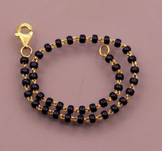 22kt yellow gold fabulous bracelet with black beads chain, amazing gifting jewelry from rajasthan india. Metal-22kt yellow gold Type- bracelet. Stone-black stone. Weight-3 grams starting weight for 7 inches. makes excellent gifting and collectible pieces. Bracelet With Black Beads, Black Beads Chain, Bracelet Stone, Light Weight Jewelry, Beads Chain, Bracelet Design, Rajasthan India, Beads Bracelet, Black Stone