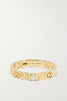 'GG' monograms trace Gucci's ring, along with a single bezel-set diamond. Perfect for stacking, it's crafted from 18-karat gold and engraved with sun rays - a subtle detail that makes catching the light beautiful. Gucci Designer Rings In 14k Gold, Gucci 14k Gold Designer Rings, Designer Gucci 14k Gold Rings, Gucci Gold Wedding Ring, Gucci Gold Rings For Wedding, Designer Yellow Gold Brilliant Cut Diamond Ring, Designer Yellow Gold Diamond Ring With Brilliant Cut, Gucci Fine Jewelry With Diamond Accents, Gucci Gold 14k Gold Rings