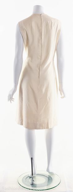 "▲The Details▲ -Vintage 60's Cream White Silk Originala Dress -Sleeveless Shift dress -Hidden inset seams along darts -Princess Seams -Polyester satin lining -this dress if a piece of vintage history A little bit of history on Originala Originala was one of the better suit and coat houses located on Seventh Avenue in New York. It was started in 1941 by the Bader Brothers. Through the years, several well known designers worked at Originala: Marc Bohen (who went on to design at Dior) was there in Vintage Silk Midi Cocktail Dress, Vintage Silk Midi Dress For Cocktail, Vintage Silk Formal Dresses, Formal Fitted Beige Silk Dress, 1950s Vintage Fashion Silk Dress, Fitted Beige Silk Dress, Beige Fitted Silk Dress, 1950s Style Fitted Silk Dress, 1950s A-line Formal Dress