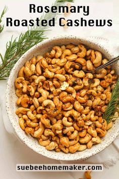 rosemary roasted cashews in a white bowl