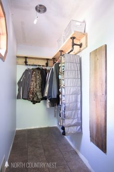 the closet is clean and ready to be used as a clothing storage area for clothes