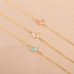 Our 14K Gold Butterfly Bracelet is a dainty and enchanting piece, perfect for adding a touch of whimsy and color to your jewelry collection. Each bracelet features intricately crafted butterfly charms, detailed with vibrant enamel in shades of blue, pink, or white. These charms, measuring 9mm x 6mm, are set against the backdrop of lustrous 14K gold, available in your choice of Gold, Rose Gold, or White Gold. The adjustable length of 6.5" to 7.75" ensures that the bracelet can comfortably fit a v Friendship Butterfly Charm Jewelry, White Butterfly Charm Bracelet For Gift, Rose Gold Adjustable Jewelry With Butterfly Charm, Adjustable Rose Gold Jewelry With Butterfly Charm, Adjustable Jewelry With Butterfly Charm For Friendship, Adjustable Butterfly Charm Jewelry For Friendship, Butterfly Charm Bracelet Jewelry Gift, Dainty Butterfly Charm Bracelets For Gift, Dainty Butterfly Charm Bracelets As Gifts