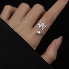 D I A M O N D ∙ I N I T I A L ∙ R I N G The most unique jewelry you can find, the perfect gift for you or your loved one. Introducing our exquisite Letter Initial Ring, a stunning blend of elegance and personalization that elevates your style to new heights. Crafted with the finest materials and attention to detail, this ring is a symbol of individuality W H Y ∙ Y O U 'L L ∙ L O V E ∙ I T• It's dainty and can be worn every day• A special piece you'll treasure for life• High-quality materials and Luxury Initials Engagement Rings, Luxury Diamond Ring With Initials For Gift, Modern Initials Jewelry For Wedding, Silver Open Ring Jewelry For Valentine's Day, Modern Jewelry Gifts With Vs Clarity, Modern Initials Wedding Jewelry, Modern Jewelry Gift With Vs Clarity, Modern Jewelry With Vs Clarity As A Gift, Modern Jewelry As A Gift With Vs Clarity