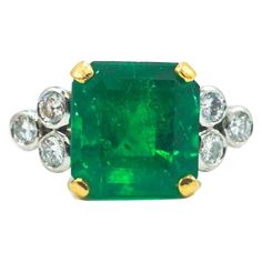 18 Karat Emerald and Diamond Ring with AGL Report | From a unique collection of vintage More Rings at https://www.1stdibs.com/jewelry/rings/more-rings/. Vintage Cluster Ring, Emerald And Diamond Ring, Cushion Cut Ring, Emerald Diamond Ring, Diamond Jewelry Designs, Fancy Diamonds, Ancient Jewelry, Shiny Things, Diamond Set