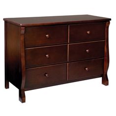 a brown wooden dresser with six drawers