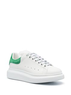 Oversized leather sneakers from Alexander McQueen featuring white, jade green, calf leather, logo-print tongue, contrasting heel counter, round toe, front lace-up fastening and rubber sole. Size Info IT Color Detail Green Made In Italy Material Calf Leather 100% Season One Fall-Winter Season Two Fall-Winter Product sneakers Brand Alexander Mcqueen Size And Fit Heel 1,8 in / 4,5 cm; Platform 1 in / 2,5 cm Alexander Mcqueen White, Sneakers Green, Alexander Mcqueen Sneakers, Mcqueen Sneakers, Travel Tote Bag, Crossbody Tote Bag, Moon Boots, White Jade, Blazer With Jeans