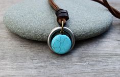 "This versatile necklace is adjustable to your desired length between 16\" and 32\". (40cm - 80cm), can be worn both short or long. The heavy-duty ring measures a little over 1 inch. The turquoise howlite stone is 0.75 inch. Ships in a gift box for easy gift giving! Shipping Details: All items will be shipped First Class by the United States Postal Service. An option to upgrade shipping to Priority or Express Service is available upon checkout for USA orders. You will be provided with a tracking Howlite Stone, Turquoise Howlite, Postal Service, Mixed Metals, Easy Gifts, Blue Stone, O Ring, Stone Necklace, Gift For Him